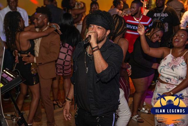 A vocalist performing on the dance floor