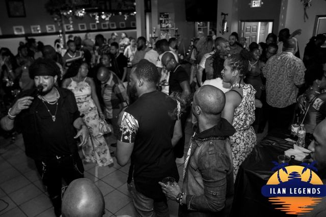 The packed dance floor in black and white