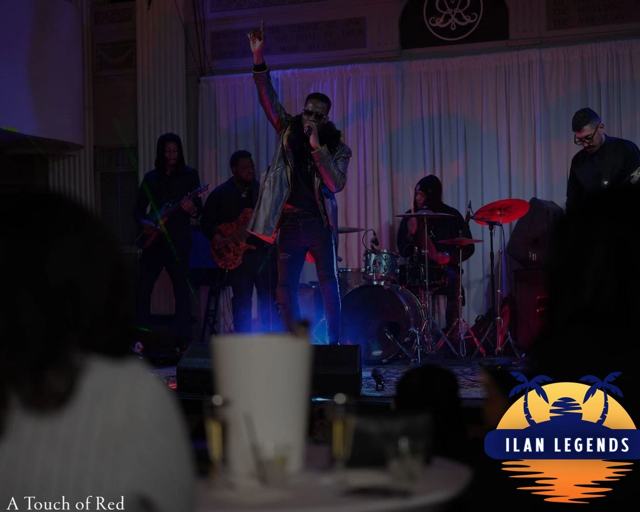The band performing at A Touch of Red