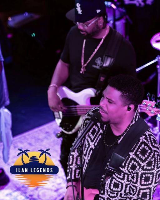 The bassist and guitarist on stage