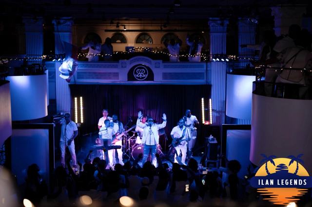 The band on stage, seen from the floor
