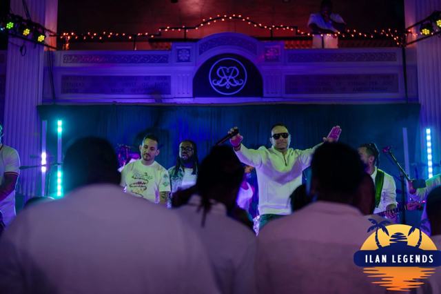 The band performing on stage