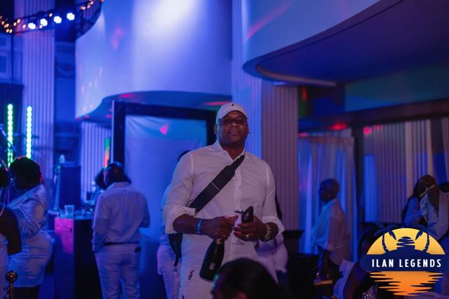 Guests on the dance floor under blue light