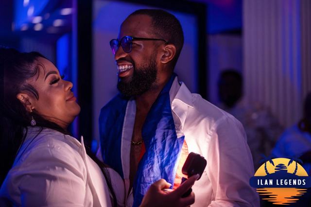 Two guests laughing together