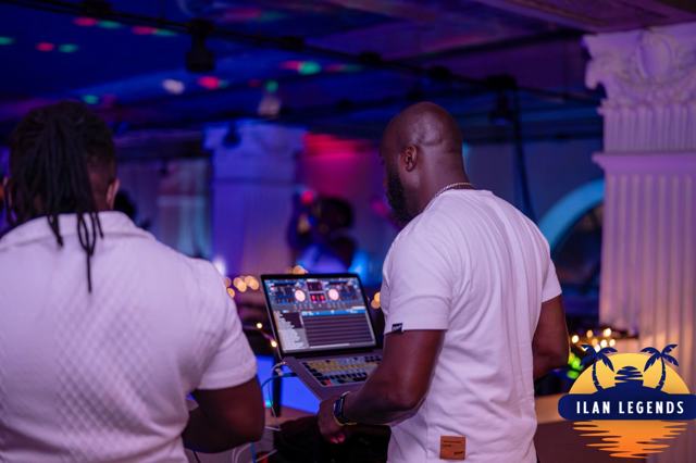 The DJ and a guest by the booth