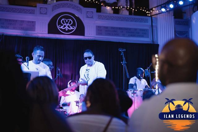 The band performing for the crowd