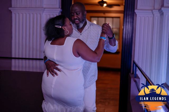 A couple dancing by the columns
